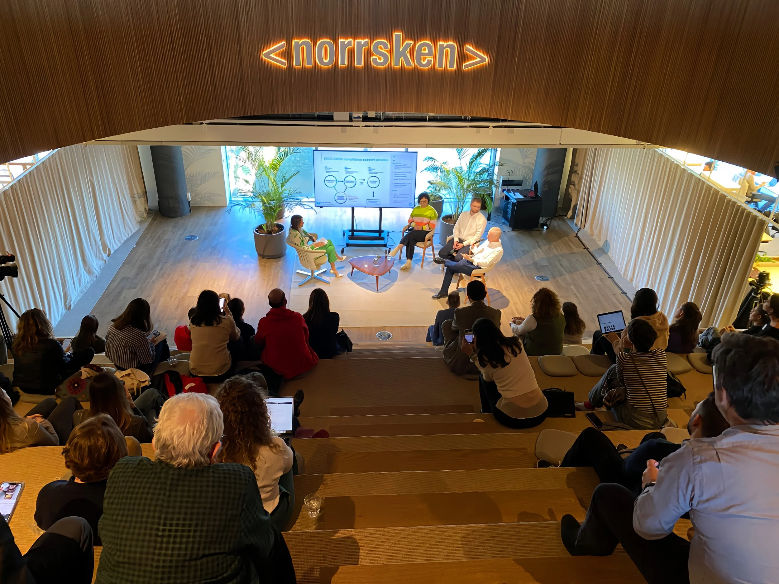 Audience listening to a panel discussion at Norrsken House Barcelona